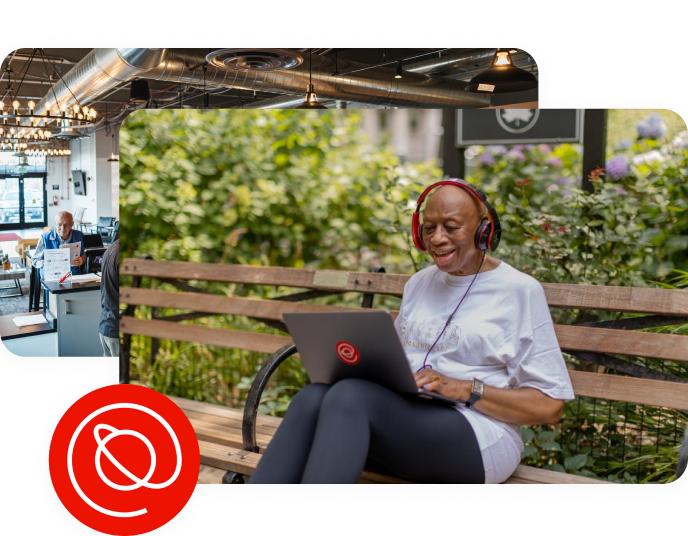An older woman sits on a wooden park bench, smiling as she uses a laptop with the Senior Planet logo. She is wearing headphones, a white t-shirt, and dark pants, surrounded by greenery in the background.