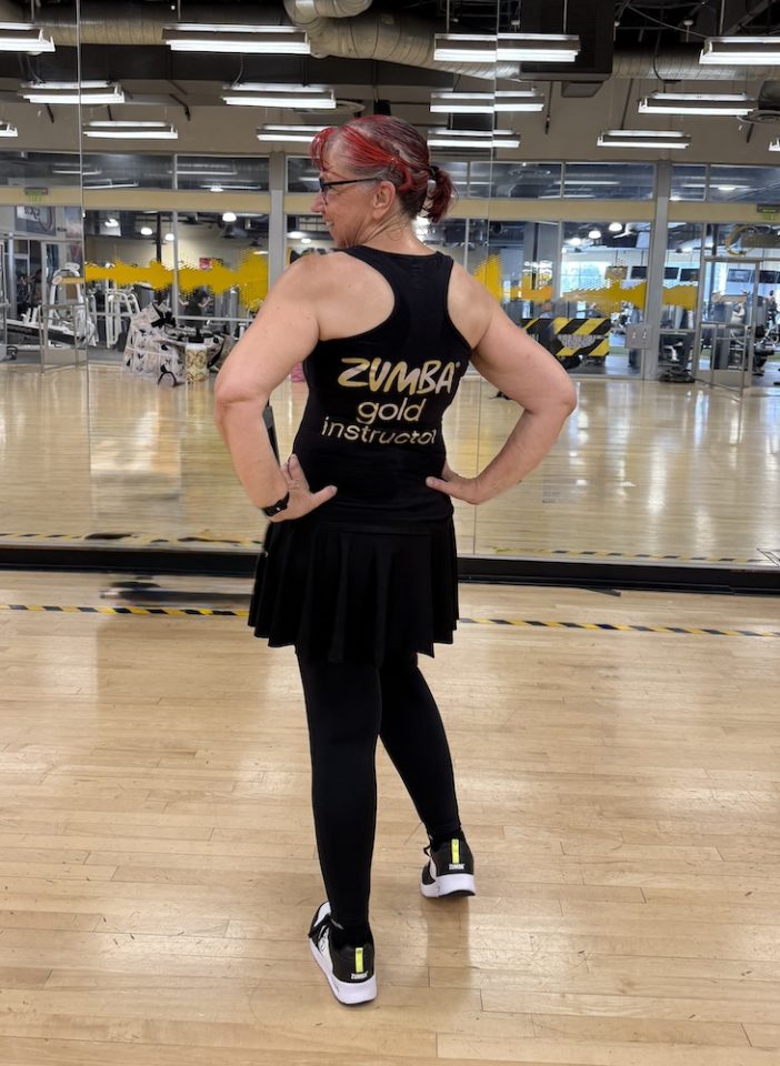 senior woman wearing Zumba Gold Instructor tank top