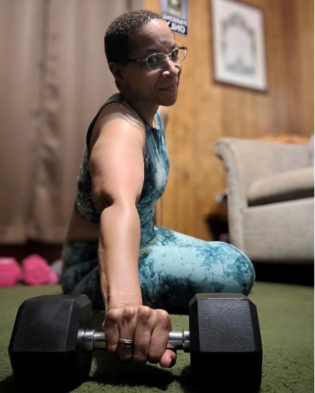 senior woman working out at home